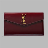 UPTOWN POUCH IN PATENT LEATHER