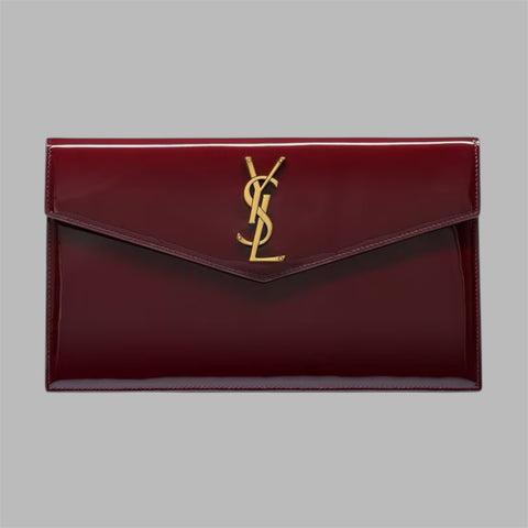 UPTOWN POUCH IN PATENT LEATHER