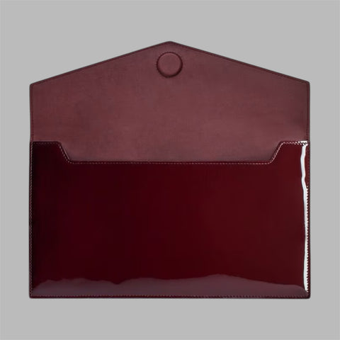 UPTOWN POUCH IN PATENT LEATHER